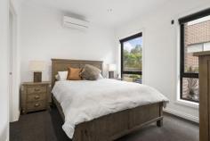  19/87-93 Radford Rd Reservoir VIC 3073 $680,000 - $740,000 Stylish, spacious and perfectly scaled, this contemporary home offers a serene lifestyle with great connection to the outdoors in a highly prized pocket. Abutting Central Creek, parkland surrounds you in every direction, with the Merri Creek walk metres from your door. These surrounds are enhanced by easy access to public transport, High Street, and the cultural commons of Sydney Road. Inside, this dual level townhouse boasts polished hardwood floors, sun-swept interiors, and generous dimensions. From the premium homemaker kitchen with 90mm oven and breakfast bar to indoor-outdoor entertaining options, there is much to love about this exceptional family home. Prized features include bedrooms with built-in robes, master with walk-in robe and jack-and-jill ensuite, split-system air-conditioning in each bedroom, multiple entertaining areas, generous storage options, and garage with internal access. 