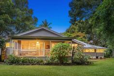  493 Friday Hut Rd Brooklet NSW 2479 $5,000,000This magnificent homestead on 66 acres is framed by trees, with a circular driveway entry and gardens abundant in colour and birdlife. Classic high ceilings, timber floors, French doors, original fretwork, coloured glass and shady verandahs set the tone for this magnificent family home. 2 bedrooms, 2 bathrooms, a formal lounge and living room plus a reading room in the original Queenslander. Beautifully blended, the second timber house is connected by an enclosed sunny living space and has its own kitchen, bathroom, games room and three bedrooms. It is simply ideal for a large family or for entertaining with guests. A free standing farm office is the ultimate retreat. A private Brooklet oasis planted with income producing macadamias providing a good income and primary production status. With approx 3700 macadamia trees producing an average of 50 ton and all the necessary infrastructure. Machinery can be included, management could be available. 