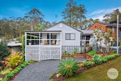  4 Purcell Avenue Lemon Tree Passage NSW 2319 This coastal inspired fully renovated home offers comfortable, contemporary living. The natural warmth of timber floors is a perfect accompaniment to the neutral decor. Positioned in a quiet cul-de-sac and close proximity to the water's edge, marina, local cafes and the renowned "The Poyers" fine dining restaurant. Some of the features of this beautiful home include: • Timber floors and ducted air-conditioning throughout • Slow combustion fire • Light-filled open plan lounge and dining area flowing out to the wrap around deck • Kitchen appointed with all new appliances • Two of the three bedrooms are fitted with built-in robes • Luxe bathrooms • Single lock up garage • Loads of storage area under the house • Plenty of off-street parking for the boat and all the toys • Land size approximately 506m2 Lemon Tree Passage is approximately a 30-minute drive to Iconic Birubi Beach, 25-minute drive to Newcastle Airport and a 45-minute drive to Newcastle. Homes like this, in this location rarely come onto the market. 