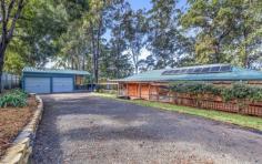  40 Burrawan Dr Wauchope NSW 2446 $770,000 * Highest residential town property on a corner block, approx 3894m2 with subdivision potential STCA * Approx 128m2 of residence with 3 bedrooms, 2 bathrooms & parking for 3 vehicles * Tiled throughout living area * Tidy timber kitchen with 4 gas burners, dishwasher & new rotisserie electric oven * Master has ensuite with large walk-in robe * Other 2 bedrooms with built-in robes * Solar power panels * Yard has tidy established gardens, covered spa awning, colorbond garden shed & cubby house * Colorbond garage with 2 roller doors, attached carport for 1 vehicle 