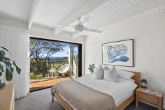  52 Riviera Ave Avalon Beach NSW 2107 Enjoy total privacy and treescape views over the ocean from the tranquil surrounds of this sunbathed coastal home. Relaxed style and contemporary comfort sit in perfect harmony over the four bedroom dual level design, while a series of decks create a natural extension of the interiors and effectively bring the outdoors in. Resting on 1,252 sqm amidst level lawns, soaring trees and gardens with a heated pool as it's striking centrepiece. A world away from care, this secure haven is located within close proximity to trendy village shops, cafes and dining, plus the beach and boating on Pittwater. - Optimal north aspect bathes the interiors in all day sun, cooling cross breeze - Outlooks over the ocean to the Central Coast - Free flowing lounge and dining area, dressed in neutral tones extends outdoors via bi-fold doors - Stone crafted island kitchen with stainless steel appliances, Bosch dishwasher - A choice of decks catering to all occasions and adaptable to the season - Master suite with ocean views, private deck and ensuite with spa bath  - All bedrooms with brand new custom made built-in wardrobes - Chic bathrooms, separate w/c, functional laundry, air conditioning - Casual living room with gas fireplace on entry level flows to outdoor terrace overlooking garden and pool - Solar heated pool, level lawns and established gardens, abundant fauna  - Lock up garage, plus additional off-street parking, workshop/storeroom - Set down a long private driveway enhances peace, privacy and security 