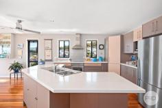  6a Sailfish Street Corlette NSW 2315 Perfectly located on one of the highest points of Corlette, this substantial freestanding home captures beautiful water views overlooking the bay and through to the blue water wonderland of Port Stephens. The home is perfectly configured to capture sunlight all day but when afternoon comes grab your choice of beverage and watch the sun disappear into the horizon from the large undercover balcony. The quiet, yet central location allows for only a short drive to many of Port Stephens most popular hotspots. Five minutes in a car will have you arriving at either the beach, shops, restaurants, cafes, parks plus much more. Property features include: • Four spacious bedrooms with built-in robes • Two bathrooms including en-suite to main • Separate powder room • Open plan kitchen, dining & living area flowing out to the balcony • Enjoy water views from the large kitchen • Two separate living areas • Polished timber flooring throughout the upper level • Air conditioning throughout along with ceilings fans • Large balcony fitted with pull down privacy screens • Separate undercover outdoor entertaining area • Well maintained, low maintenance grounds and gardens • Double lock up garage with additional outdoor parking 
