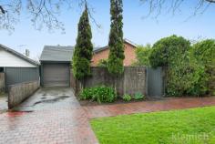 13A Chatsworth Grove Toorak Gardens SA 5065 Perfectly positioned in a treelined street, this Torrens titled, solid brick home offers a flexible multifunctional floor plan. A wide entry hall leads to a spacious formal living and formal dining area, flooded with wonderful natural light from large windows and the glass doors to the adjoining side courtyard. The 3 bedrooms throughout the home are also treated to natural light, the main bedroom features walk in robe and spacious ensuite. At the rear of the home is the kitchen, featuring Miele and AEG appliances, ample storage space and convenient breakfast bar, with the north facing living area overlooking manicured gardens and an outdoor entertaining area. Includes single file garaging for 2 cars under the main roof as well as driveway off street parking. Conveniently located in this quiet street, there is something for everyone with easy access to transport, only a short drive to spend the day shopping at Burnside Village or Dulwich Village with Norwood Parade and the city also not far away. Perhaps a weekend stroll through the beautiful Tusmore Park or Fergusson Square is more your thing. The home is zoned to Rose Park primary School and the well-known Marryatville High School with many prestigious colleges close by. 