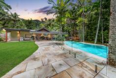  72 Timberland Road Jubilee Pocket QLD 4802 Luxury and privacy combine to create the perfect place to relax in your slice of tropical paradise. The 2.8 acre property is completed by picturesque tropical gardens and enjoys prime position on the sought-after Timberland Road just minutes from the hustle bustle of Airlie beach. From the moment you set foot on the property it's hard no to notice that quintessential resort vibe. The executive home is perfectly suited to those looking to entertain and boasts beautiful timber floors, high ceilings and stunning gourmet kitchen. The three bedrooms are spacious, with the master bedroom featuring a walk-in-robe and private, double shower and spa. Moving outside the integrated bi-fold doors lead seamlessly to the outdoor living space then onto the pool area complete with waterfall all set the backdrop of tropical gardens. Beautiful and practical the main residence is supported a dedicated office space, a separate and secure three car garage, approved high clearance 7x10m shed: The garage features it's own toilet, outdoor shower and dedicated storage spaces. 