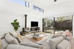  12 John St Elwood VIC 3184 $2,900,000 - $3,100,000 Sited on a double-fronted block, this builder's-own freestanding Edwardian has been superbly renovated and extended with uncompromised comfort and craftsmanship throughout its single-level design. The original façade has been retained and the interior transformed only 12 months ago into a spectacular contemporary domain perfectly attuned to modern lifestyle desires. With high ceilings carried throughout, the home's impressively proportioned floorplan showcases a show-stopping living and dining room with a luxurious amount of space, endless streams of natural light, and soaring sloped ceilings adding fantastic vertical volume. There's also a wood heater to unwind in idyllic fashion during those cooler months. Anchoring the lofty airy space is a sky-lit gourmet kitchen making it easy to indulge your culinary skills thanks to its precision functionality and the high-end inclusions of a centerpiece island bench/breakfast, white marble surfaces, Blum cabinetry, dual pyrolytic ovens, induction and gas cooktops, fridge plumbing provision, and a butler's pantry with additional sink. At the front of the home, the five-star main bedroom offers a private retreat with a window seat and a walk-through robe to a sensational ensuite bathroom with double shower and twin vanities. Three additional bedrooms are serviced by an equally stylish family bathroom with bathtub and shower. A peaceful north-facing deck and rear garden offer exceptional alfresco entertaining and relaxation complemented by the rustic brick and black cladding adorning the rear façade. The residence also benefits from a fitted home office which can be closed off for working without distraction, a full laundry room, 16kw ducted reverse-cycle heating and cooling, floor heating in the two bathrooms, extensive 8 x3 m plastered roof storage, top-of-the-range 6mm European Oak floorboards, high-quality wool carpets, Franke tapware, CCTV security, built-in speakers indoors and out, and prized off-street parking for two cars. Giving it a 'brand-new edge, the home has also been rewired, replumbed and reinsulated and fitted with a new sewer, storm water and roof. Stroll in any direction to find a fantastic selection of lifestyle amenities, including Elwood Primary and College, St Columba's Primary School, Brighton Road trams, Tennyson Village, Ripponlea Village and Station, Elsternwick Park, St Kilda Botanical Gardens, and Elwood Beach. 