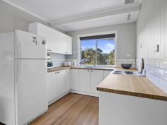  4 Fourth Ave Sandy Point VIC 3959 $750,000-800,000 Completely updated to offer the perfect low maintenance escape just two minutes stroll to Ned Neales lookout and the dog friendly end of the beach. Filled with natural light flowing out to entertaining decks on both sides of the home, the open plan living space is quick to heat and cool with the convenience of a RC/AC. Easy care timber flooring continues into the as-new kitchen with gleaming white cabinetry, electric appliances and servery to meals area. Two spacious bedrooms, central modern bathroom with stunning terrazzo tiles and upsized shower. Gently undulating block of approx. 772m2 with long northern aspect, fully fenced at the rear - side gate access for caravan or boat access, LU shed and still room for games of cricket. Established trees for shade, shelter and the visiting koalas. Being sold fully furnished and ready to go. If you are looking for an easy care getaway where you can focus on enjoying the great outdoors. 