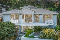  13 Noorinan Street Kiama NSW 2533 $1,750,000 - $1,850,000 Impeccably maintained throughout, this unique and substantial home offers multiple entertaining areas enjoying panoramic township and ocean views, all located in the highly prized central Kiama locale. Step out from the master bedroom onto the balcony and take in the morning coastal views or beautiful afternoon sunsets over the escarpment, or head up to your private courtyard and enjoy your terraced gardens and ocean views. This unique home has plenty of space with options and is sure to impress. The home features 4 bedrooms in total, master with updated bathroom and spacious walk-in robe, light filled open-plan living flowing into a large kitchen with butler's pantry, multiple entertainment balconies and courtyard, freshly polished timber flooring, new carpet throughout, 2 generous bathrooms with extra powder room, ducted air-conditioning, substantial double garage with remote access and stunning terraced gardens surrounding the home. Positioned on the high side of Noorinan Street, this contemporary coastal haven truly is one of a kind. Located within walking distance less than 1km from Kiama's pristine 'Surf' beach, train station, shops, and cafés, you will certainly enjoy the Kiama lifestyle on offer. 