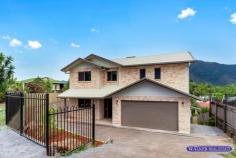  28 Allinga Close Bentley Park QLD 4869 $720,000 This new home has just been built on the last remaining block of land in Allinga Close all of a generous 900 m2. Commanding fantastic views over the valley looking towards the Dinden West Forest Range as well as views from the front looking toward Cairns. This two storey home is constructed with Brisbane Sandstone cut concrete blocks offering a classy and different look topped off with a colorbond roof. Downstairs the home features a double garage under the roofline, polished concrete floors, a fully appointed kitchen with dining and family rooms plus a lounge room. This all opens out onto a rear undercover balcony. A separate toilet is located besides the laundry that takes you into the garage area. Upstairs you have four bedrooms, the master has a walk-in-robe as well as a second smaller wardrobe for the person who is not so fashion conscious. The ensuite is large with double sinks, bath and shower and offers mountain views. Stepping across toward the other three bedrooms you pass a conveniently located second bathroom that has the most attractive tiling. Upstairs has top quality vinyl flooring and carpet in the master bedroom. The whole house is fitted with six split system air-conditioners. Downstairs • Aluminium sliding windows & doors secured with Crimsafe & Amplimesh grills • Double lock-up garage with workshop area • Slate flooring to laundry & downstairs toilet • Kitchen has granite benchtops, Bosh dishwasher & ducted extraction fan, Smeg Gas oven and cook top • Large ceiling fans to family & lounge rooms • Split system air conditioning, two in total downstairs • Polished concrete floors downstairs • 8 m x 4 m timber deck under roof line Upstairs • Master bedroom has large Walk-In-Robe and ensuite with separate bath and shower and double sinks on vanity • 3 bedrooms with built-in-robes • Vinyl plank flooring • Ceiling fans and splits system air-conditioners to all bedrooms • 6.5 Kilowatt solar/ electric hot water The back yard has plenty of room to install a swimming pool or lay down a good sized lawn, this has not been landscaped and stands ready to have a pool installed and landscaped to the buyers individual taste. Boundary retaining walls are galvanised steel H sections and reinforced concrete as against the less expensive treated pine option. 