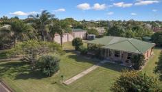  82 Poinciana Drive Innes Park QLD 4670 Big Block … Big Shed … Brick Home = Options When you have Space, you have Options This ½ (2,154m2 ) acre block just south of Bargara presents you with so many options. 82 Poinciana Dr is situated on the fringe of the new development corridor of south Bargara to Bargara Headlands. This established half acre block in North Innes Park has a large high clearance powered 5 bay shed ( 18 x 8 x 2.9m ) and a modest 3-bedroom brick home that gives you options to either renovate, extend or rent out and use the shed for your personal use. Built in the early 2000s this solid brick and Colourbond home is modest but functionable with a large patio facing east and overlooking the established gardens and capturing ocean breezes. With a vegie patch, green house and an abundance of exotic fruit trees, solar panels, 1,6250L water tank and your own native bee hive, this property conjures up self-sufficiency. Not too many ½ acre blocks come up in this area. It is well worth the look to get your investment mind thinking. 