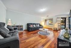  28 Enfield Turn Carramar WA 6031 $600,000 This stunning 4-bedroom, 2-bathroom, property ticks all the boxes! Features & benefits include: * Double door entry with crim-safe screens * Home theatre / formal lounge * Master bedroom with walk in robe, ceiling fan & renovated ensuite with twin vanities, shower & separate powder room with access from the hall * Spacious study / 5th bedroom * Open plan family, meals & games areas * Kitchen with fridge recess, pantry, shoppers access from the garage & stainless steel oven, cooktop & dishwasher * 3 further spacious bedrooms with built in, mirrored robes * Family bathroom with vanity, bath & shower * 2nd WC * Laundry * Quality wood flooring * Alarm system * Reverse cycle, zoned air conditioning for year round comfort * 3.78 kw (12 Panels) Solar Electricity system to cut down on power bills * ENVIRO HEAT Heat Pump Energy efficient hot water system * Outdoor, undercover entertainment area * Sparkling, solar heated pool * 2 Garden sheds, one with power * Double, remote garage with roller door access to the rear * 601sqm block * Close to parks, schools, shops, The Duke Bar & Bistro, transport & all other local amenities 