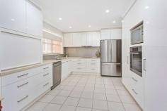  50 Kalang Road Kiama Heights NSW 2533 $1,995,000 - $2,100,000 Perched up high with breathtaking views over 'Loves Bay' and rural rolling hills lies this well maintained and modernised family home. Solidly built and having had just the one owner, this property enjoys plenty of natural light and an outlook most people dream of. Idyllically located in the Kiama Heights enclave this home is situated between the pristine 'Easts' beach & 'Loves' bay, coastal walking tracks and headland reserve, offering the coastal lifestyle change you have been dreaming of. This substantial home comprises of 5 bedrooms, master with ensuite and walk-in robe, 3 bathrooms, 2 separate living areas, impressive modern quality kitchen, drive-thru garage and large entertainment deck flowing effortlessly from the main upstairs living area. Additional features include fantastic storage, room in the garage for a workshop, above ground pool, 6.6kw solar panel, 2 x water tanks, split system a/c and potential to create self-contained flat with downstairs bedroom. Situated on an expansive 797sqm block with established gardens and surrounds, there is a feeling of space and plenty of room to grow your own vegetables or yard for the kids to run around. With this home already modernised throughout and a spacious entertainment deck off the main living room taking full advantage of the stunning coastal line, there will be plenty of time to entertain friends/family or sit back and enjoy vista. 