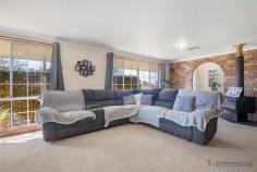  1 Finlayson Close Armidale NSW 2350 $420,000 to $460,000 Cheerful and cosy single level living beckons with this classic brick home. Perched within a popular North Hill setting, it features a kitchen with ample storage, open plan dining area and a separate living room. As well, it offers three bedrooms and a modern, newly renovated bathroom – and is kept toasty in winter with a wood-burning fireplace and cool in summer with reverse cycle air-conditioning. A single lock-up garage with internal access to the home is an additional bonus, while outdoors enjoy the undercover patio and a fully fenced backyard. Kids and pets can roam freely here and soak up the space of this 758m2 block, plus there is rear access. Occupying a quiet location, near PLC and Ben Venue Public School, its sunny and soothing interiors will ensure you feel right at home.  