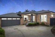  45A Balmoral St Kilsyth VIC 3137 $750,000 - $800,000 A modern, contemporary and stylish 3 bedroom home, privately positioned and conveniently located across the road from Balmoral Reserve. Presenting a boutique single level design enhanced with quality Spotted Gum solid timber floors, high ceilings, Bellini cooking appliances, and welcoming creature comforts like ducted heating, evaporative cooling and west facing double glazing windows. A home certain to please those who seek the easy lifestyle which promises minimal upkeep. Occupying a 462m2 allotment, it's a favourable option for busy families, investors and downsizers, with the benefit of having shops and schools close by, including Pembroke Primary School and Kilsyth Primary School which are both approximately 1km away. Explore a wonderful open plan layout with an adjoining kitchen and easy access to the courtyard, together with a full ensuite in the master, BIR's in the other 2 bedrooms, immaculate family bathroom with separate toilet, double garage with an internal storage area with roller door access (approx 4.5x1m), and a water tank. 