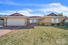  63 Balladong Loop Carramar WA 6031 $599,000 If you have been searching for a property with space for the cars, boat, caravan & toys, that has full drive through access to undercover parking & a huge, powered brick-built garage / workshop, this is it! Features & benefits include: *     Entrance hall *     Formal lounge / dining *     Master bedroom with walk in robe, split system air conditioning & ensuite with vanity, shower & WC *     Open plan family & meals areas *     Kitchen with stainless steel oven & dishwasher, 900mm gas cook top, microwave recess, pantry, and shoppers’ access from the garage *     Games room *     2 further spacious bedrooms with built robes *     Family bathroom with vanity, bath & shower *     2nd WC *     Laundry *     Walk in linen cupboard *     Utility Room *     Ducted air conditioning *     Ducted gas heating *     Skirting boards *     Security screens *     Large, undercover entertainment area with drive through access *     Huge, powered, brick workshop with remote roller door (potential to convert into a granny flat / studio / work from home space) *     Double, remote garage with rear drive through access to workshop *     Large 670sqm block *     Close to schools, shops, parks, transport & all other local amenities 