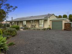  870 Stony Creek-Dollar Rd Foster North VIC 3960 Set on approx. 4.4 acres, this immaculately presented property enjoys total privacy and a spectacular unrestricted outlook over the surrounding countryside. The long verandah is just the spot to sit and watch the sunsets and the rear patio complete with pizza oven is perfect for alfresco entertaining in any season. Sleep under the stars on the bespoke camping platform. Watch the moon rise and the milky way move overhead. The modern, open plan 'L' shaped living / dining room features a super efficient wood heater plus the convenience of a RC/AC. Filled with natural light, every windows frames the amazing outlook and connects you with the garden setting. Light and bright, the well appointed kitchen adjoins a meals area. There are three fitted bedrooms, master with walk in robe and ensuite. Central family bathroom, fitted laundry and separate w.c. Minimise your running costs with solar plus mains power, solar hot water. Lock up garage plus freestanding shed / workshop or studio space with access from the expansive flat parking area. Low maintenance native gardens, well fenced paddocks with water to utilize yourself or continue to allow the neighbour to use. Only 8 minutes from Foster, Meeniyan or Dumbalk, this is the perfect country escape. 