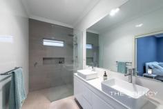  7 Surrey Road Rivervale WA 6103 $1,000,000 Situated in a cul-de-sac in the high-end precinct of Rivervale, this four-bedroom, two-bathroom home is one of a kind. Occupying a 683sqm block, this character home offers everything a family or professionals could possibly desire, and as it's move-in ready, this is an investor's dream. Completely renovated throughout, this weatherboard property features stunning Blackbutt floorboards, leadlight windows, high ceilings and a wide hallway drawing your eye to gorgeous open plan living. The gourmet kitchen will inspire even the most reluctant cooks, especially when alfresco entertaining on the generous North-West facing deck. The remote-controlled white picket fence and front porch completes the pretty picture. Features at a glance: • Gourmet kitchen with engineered stone countertops, bench seating, dual sinks, free-standing 5-burner gas cooktop & 900mm oven, picture window, Bosch dishwasher, microwave recess, pendant lighting and huge amounts of storage • Walk-in Butlers Pantry with countertop and room for extra fridge • Spacious open plan living with built-in cabinetry and pendant lighting • Master bedroom includes an ensuite with dual vanities, large walk-in robe and French doors to the deck • One bedroom features an exposed brick chimney and could function as a formal lounge/home office • Main bathroom with exposed brick chimney, bathtub and a separate toilet • Both bathrooms feature floor-to-ceiling tiles, frameless shower screens and floating vanities with engineered stone countertops • Decked alfresco dining under the main roof with downlights, a fan, café blinds and a serving bench to the kitchen • Carpet and ceiling fans in the bedrooms • Separate laundry with loads of storage and external access • Ducted Reverse Cycle air-conditioning • 6.65kV Solar Panels with 5kV Inverter • Security screens & LED downlights • NBN wired direct to House with fully built-in wired Network cabling to each bedroom • Double carport and plenty of additional parking • Powered and plumbed workshop with a 3rd toilet and room for a car/trailer including electric roller door • Easy-care and fully-enclosed gardens behind a remote-control white picket fence • Fully renovated character weatherboard home 