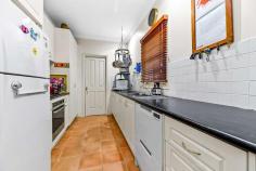  4A Tyne Street Box Hill North VIC 3129 $1,100,000-$1,200,000 Moments away from a number of idyllic parks, reserves and sporting fields is this lovingly presented double storey semi-detached home. Within walking distance to the bustling centre of Box Hill and the train station, this home presents plenty of character and street appeal with a white picket fence, Tudor-style rendered inserts, solid brick veneer and a portico framed by a welcoming archway. A single lock-up garage and concrete driveway provide ample off-street parking. Upon entry, crisp white walls high ceilings and ornate cornices promote a fresh, yet homely appeal. Windows are furnished with timber Venetian blinds, and the home promotes a flow through to an open-plan living and dining layout which leads out to a sun-filled backyard with a covered pergola for entertaining. The kitchen is an effective use of available space and is finished in tones of white with shaker-style cabinetry and a sparkling tiled splashback contrasting nicely with the terracotta-look ceramic floor tiles. A rounded-edge 40mm laminate counter top runs throughout and built-in appliances will please the home chefs. A Fisher & Paykel dishwasher makes cleaning up a breeze. Three bedrooms are found in this home, with one conveniently positioned on the ground floor with a boxed bay-style window to suit visitors and multi-generational living. Built-in robe storage is abundant, and the master enjoys plenty of space, a ceiling fan and a private ensuite. Bathrooms in the home are highly-appointed, with the main bathroom boasting some recent upgrades with new tiles and a fully frameless shower. Leave the car at home, and walk to Box Hill Station and its multitude of surrounding restaurants, cafes and retail shopping. Box Hill Hospital and medical precinct is also within a 20 minute walk, while the idyllic Box Hill Gardens. Well situated within the double school zone of Kerrimuir Primary School and Box Hill High School and St Francis Xavier's Catholic Primary School are close by. Property Specifications: · Three bedroom double storey semi-detached house with a sunny backyard adjoining a covered pergola · Quiet position, with off-street parking available via a concrete driveway and single lock-up garage · High ceilings, plush carpet, furnished windows and more are well presented · Original finishes throughout kitchens and bathrooms, with the main vaunting some recently appointed upgrades · Walk to schools, parks, medical/hospital, train station, restaurants, supermarkets, shops, cafes and much more 