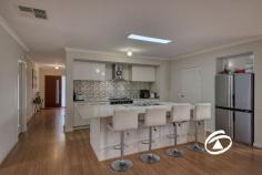 25 Penshurst Cres Officer VIC 3809 $845,000 - $895,000 Beautifully presented both inside and out, this modern single-level home delivers a new level of luxury whilst also being tailor-made for relaxed family living. Positioned in a quiet enclave within the highly regarded Timbertop Estate, walking distance to local schools, parks and reserves and only moments away from shopping centres and public transport. A new lifestyle awaits you. Accommodation comprises of four bedrooms, master at the front of the house with complete ensuite and walk in robe. The remaining three bedrooms can be found at the rear of the home all with double built in robes, seperate living area and easy access to the main bathroom. The main living and dining area is open plan and light filled and is further complimented by a white and bright kitchen. Designed to inspire any home chef, the kitchen boats a huge island bench, stainless steel appliances, gas cook top, 900ml oven, dishwasher, an array of storage and walk in pantry. A further formal living area adjoins this domain. Continuing on outside you will be greeted with an alfresco area with café blinds making the perfect space to entertain both family and friends. The remaining of the backyard is low maintenance, well planted and well equipped for storage with a garden shed. Additional benefits include ducted heating, evaporative cooling, powder room, large laundry and oversized double car accommodation. 