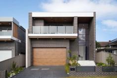  5 Stoney Creek Road Beverly Hills NSW 2209 $2,300,000 Ideally located within a 10 minute walk to Olds Park, Penshurst & Peakhurst Shops, public transport and more, this elegant full brick home offers modern living in a prized pocket of Beverly Hills. Positioned on an elevated 465m2 block, this double storey home is abundant with natural light. The carefully considered layout contains soaring high void area upon entrance, oversized family kitchen on the ground floor adjoining open plan living that flows to undercover outdoor entertaining and backyard. There are four oversized bedrooms upstairs and a guest bedroom downstairs, all with built-in-robes. The property also has a self-contained two bedroom granny flat, both with ensuites - providing endless potentials to cater for all your family's needs. 