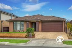  25 Penshurst Cres Officer VIC 3809 $845,000 - $895,000 Beautifully presented both inside and out, this modern single-level home delivers a new level of luxury whilst also being tailor-made for relaxed family living. Positioned in a quiet enclave within the highly regarded Timbertop Estate, walking distance to local schools, parks and reserves and only moments away from shopping centres and public transport. A new lifestyle awaits you. Accommodation comprises of four bedrooms, master at the front of the house with complete ensuite and walk in robe. The remaining three bedrooms can be found at the rear of the home all with double built in robes, seperate living area and easy access to the main bathroom. The main living and dining area is open plan and light filled and is further complimented by a white and bright kitchen. Designed to inspire any home chef, the kitchen boats a huge island bench, stainless steel appliances, gas cook top, 900ml oven, dishwasher, an array of storage and walk in pantry. A further formal living area adjoins this domain. Continuing on outside you will be greeted with an alfresco area with café blinds making the perfect space to entertain both family and friends. The remaining of the backyard is low maintenance, well planted and well equipped for storage with a garden shed. Additional benefits include ducted heating, evaporative cooling, powder room, large laundry and oversized double car accommodation. 