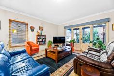  4A Tyne Street Box Hill North VIC 3129 $1,100,000-$1,200,000 Moments away from a number of idyllic parks, reserves and sporting fields is this lovingly presented double storey semi-detached home. Within walking distance to the bustling centre of Box Hill and the train station, this home presents plenty of character and street appeal with a white picket fence, Tudor-style rendered inserts, solid brick veneer and a portico framed by a welcoming archway. A single lock-up garage and concrete driveway provide ample off-street parking. Upon entry, crisp white walls high ceilings and ornate cornices promote a fresh, yet homely appeal. Windows are furnished with timber Venetian blinds, and the home promotes a flow through to an open-plan living and dining layout which leads out to a sun-filled backyard with a covered pergola for entertaining. The kitchen is an effective use of available space and is finished in tones of white with shaker-style cabinetry and a sparkling tiled splashback contrasting nicely with the terracotta-look ceramic floor tiles. A rounded-edge 40mm laminate counter top runs throughout and built-in appliances will please the home chefs. A Fisher & Paykel dishwasher makes cleaning up a breeze. Three bedrooms are found in this home, with one conveniently positioned on the ground floor with a boxed bay-style window to suit visitors and multi-generational living. Built-in robe storage is abundant, and the master enjoys plenty of space, a ceiling fan and a private ensuite. Bathrooms in the home are highly-appointed, with the main bathroom boasting some recent upgrades with new tiles and a fully frameless shower. Leave the car at home, and walk to Box Hill Station and its multitude of surrounding restaurants, cafes and retail shopping. Box Hill Hospital and medical precinct is also within a 20 minute walk, while the idyllic Box Hill Gardens. Well situated within the double school zone of Kerrimuir Primary School and Box Hill High School and St Francis Xavier's Catholic Primary School are close by. Property Specifications: · Three bedroom double storey semi-detached house with a sunny backyard adjoining a covered pergola · Quiet position, with off-street parking available via a concrete driveway and single lock-up garage · High ceilings, plush carpet, furnished windows and more are well presented · Original finishes throughout kitchens and bathrooms, with the main vaunting some recently appointed upgrades · Walk to schools, parks, medical/hospital, train station, restaurants, supermarkets, shops, cafes and much more 