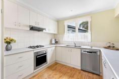  53 Summit Road Frankston VIC 3199 $1,000,000 - $1,100,000 Open plan and embraced by accommodation, space to nurture a growing family awaits within the Frankston High School Zone. Central to all health and educational offerings this home boasts walking distance to Overport Primary School, Monash University Peninsula Campus and Frankston Hospital with Frankston's further treasures beyond. Enhancing family dimensions across a 685sqm (approx.) allotment, security from street access provides peace of mind within a family-focused neighbourhood. Welcomed with a free-flowing design, the home introduces a spacious living/dining zone beyond a charming facade. Framing a view of the courtyard, expansive windows welcome natural light whilst a gas fireplace preserves warmth in the cooler months. Tucked around the corner, modern stainless steel appliances, gas stovetop and tiled splashback complete the open kitchen, orientated to share in entertaining across a seamless indoor/outdoor layout. Wrapped around the living domain, family accommodation presents a master bedroom with a walk-in robe and ensuite maximising a northern orientation with a restful ambiance. Four additional bedrooms extend throughout the home each with built-in robes, sharing a central bathroom complete with dual vanity and a bathtub. Sheltered from the harsh sun with mature foliage, the rear yard presents play space for growing children. Gas ducted heating and evaporative cooling ensure comfort for all with secure off-street parking concluding the offerings of this sensational family home, only moments from the heart of Frankston. 