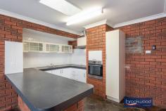  23 Markham Way Swan View WA 6056 $399,000 With expansive open plan living, a formal lounge or dining room and a terrace for outdoor entertaining, this well-presented brick and tile home delivers an excellent start for families. Set on a friendly Swan View Street, within walking distance of shopping, transport, sports and schools, the property has a fully fenced backyard with a small garden shed. 4 bedrooms 1 bathroom 1982-built brick and tile Split-level open plan living Formal lounge/dining rm Main bed w built-in robes Fully fenced backyard Sheltered alfresco living Garden shed & carport 732 sqm great location Walk to shops, transport, sports Come home to a property designed for the busy activity of family life. As you enter through the front door, open plan living extends across the floorplan to a large, sheltered outdoor entertaining zone. An extension to the original layout has fashioned a flexible shared living space with an indoor-outdoor flow. A slow combustion fireplace in the central living area and reverse cycle air conditioning in the formal lounge/dining room provide year-round comfort. A U-shaped bench with an integrated breakfast bar defines the kitchen arranged at one corner of the open plan zone; a casement opening to the formal lounge/dining room retains the sense of flow. A central hall leads to the main and two junior bedrooms, the family bathroom and a laundry with a separate WC. Both junior rooms have ceiling fans, and one has fitted robes. The main bedroom has mirror-fronted built-in robes and air conditioning. The fourth bedroom, arranged off the sunken family room, is also equipped with a ceiling fan. Double doors open to a paved terrace sheltered by a high gabled roof. This ample outdoor living space spans the rear of the home and overlooks a level lawn area with a small garden shed at one corner. Walking distance from the local shopping centre, the sporting facilities of Brown Park and hours of walking and riding along the much-loved Heritage Trail, the home is situated to make the coming and going of family life a little easier. 