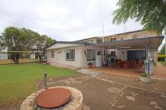  10 Gelobera Street Biloela QLD 4715 $365,000 This well-presented family home offers a point of difference in today's market. The home has several features that will impress you from the moment you enter. Situated in a quiet, family friendly neighbourhood, within walking distance to schools, sporting fields, Lion's Park and the Bowls Club, the location doesn't get much better than this! The upper level of the home boasts an air-conditioned living, dining and kitchen, completed with ample cupboard space, room for a dishwasher and a servery window through to the sunroom. There are three bedrooms, two featuring built-in wardrobes and one with a walk-in robe. Two of the bedrooms are air-conditioned. The lower level of the home offers self-contained living accommodation perfect to rent out privately, for your teenager, or merely for your guests. This area includes an air-conditioned bedroom with a private ensuite and walk-in robe and a combined living area with a kitchenette. There is a second, air-conditioned living room which can be closed off from the granny flat if required. The internal garage has car accommodation for 2 vehicles and is combined with the laundry and a third toilet. The rear under covered entertainment area is the perfect spot for all of your special occasions. With a bar, solid timber table and chairs and surrounded by established lawns and gardens, there is nothing left here to do! The 857sqm* allotment is fully fenced with a 6x9m* powered shed. 