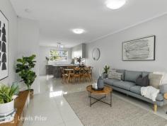  9/67 Conington Crescent Morphett Vale SA 5162 You simply will not need them when you move into your modern townhouse with shops, local facilities and transport just a stones throw away. Built in 2014 the home has a modern feel with classic neutral tones to match your colour and style. Step inside and be surprised by the size of the open plan living area while the adjacent kitchen has ample counter space and dishwasher. Upstairs, there is a well appointed bathroom, 2 good size bedrooms with sliding door robes while the main bedroom has a balcony which overlooks a tree studded park. There is also a central living room ideal for home office or kids tv/playroom. Enjoy the comfort of ducted heating and cooling plus the security of an alarm system. 