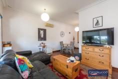  6 Russell Rd Greenmount WA 6056 $439,000 With a potential to sub divide, this Greenmount property is more than just a home. Raise a family, keep some chickens, walk the kids to school and celebrate milestones in the big backyard; this 3-bedroom home is the perfect stage for family life. The 1964-built brick and tile home has high ceilings, decorative cornicing, and timber floors throughout. Set in a friendly neighbourhood, minutes from Greenmount Primary and St Anthony’s, the home sits well back from the road behind a sweep of reticulated lawn and gardens and boasts a family-sized backyard. 3 bedrooms 1 bath 2 WC 1964-built brick and tile Open plan kitchen/meals Lounge with bay window Polished timber floors Outdoor entertaining Fully fenced backyard Single garage door 1019 sqm subdivide STA Walk schools parks bus As you step inside from the small front porch, this Greenmount home’s high ceilings and polished timber floors ensure an immediate sense of welcome. A large bay window in the lounge washes the room with natural light heightening the sense of space and highlighting the family-friendly interior layout. An open-plan kitchen/meals with an electric oven and gas hob opens to a partially enclosed verandah and sheltered patio to offer a practical indoor-outdoor layout. The outdoor living zone overlooks the generous backyard and has ample space for seating, barbecuing and dining. It provides an ideal backdrop to impromptu alfresco dinners, memorable family get-togethers and relaxed weekends reading and dozing cocooned in the green oasis of the private backyard. A central hall leads from the shared living zones to a walk-through laundry, the family bathroom and three bedrooms. Polished timber floors and high ceilings in each bedroom create a delightful sense of calm. The family bathroom has a shower, tub, vanity and WC. A second WC adjoins the laundry. The fully fenced backyard of this 1019 sqm block offers an idyllic space for kids and pets to run and play; there is even room to keep chickens, build a cubby, and plant a vegetable garden. A single garage with a paved driveway for access sits to one side of the lot. Two sheds offer storage space for garden tools and equipment. A rich and rewarding future watching your family grow, marking milestones and making memories is easy to imagine in this home and this friendly neighbourhood. 