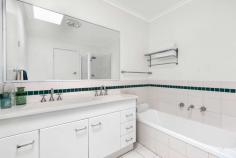  53 Summit Road Frankston VIC 3199 $1,000,000 - $1,100,000 Open plan and embraced by accommodation, space to nurture a growing family awaits within the Frankston High School Zone. Central to all health and educational offerings this home boasts walking distance to Overport Primary School, Monash University Peninsula Campus and Frankston Hospital with Frankston's further treasures beyond. Enhancing family dimensions across a 685sqm (approx.) allotment, security from street access provides peace of mind within a family-focused neighbourhood. Welcomed with a free-flowing design, the home introduces a spacious living/dining zone beyond a charming facade. Framing a view of the courtyard, expansive windows welcome natural light whilst a gas fireplace preserves warmth in the cooler months. Tucked around the corner, modern stainless steel appliances, gas stovetop and tiled splashback complete the open kitchen, orientated to share in entertaining across a seamless indoor/outdoor layout. Wrapped around the living domain, family accommodation presents a master bedroom with a walk-in robe and ensuite maximising a northern orientation with a restful ambiance. Four additional bedrooms extend throughout the home each with built-in robes, sharing a central bathroom complete with dual vanity and a bathtub. Sheltered from the harsh sun with mature foliage, the rear yard presents play space for growing children. Gas ducted heating and evaporative cooling ensure comfort for all with secure off-street parking concluding the offerings of this sensational family home, only moments from the heart of Frankston. 