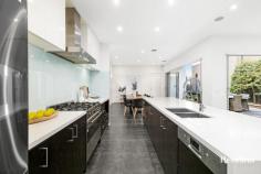  21 Lakeside Cres Maribyrnong VIC 3032 $1,400,000 - $1,500,000 You will be wowed and impressed from the moment you step inside this luxurious family home located on Edgewater's most sought after location across the water and finished to the highest possible standard with quality fixtures, fittings & appointments throughout. Boasting 4 separate living areas & comprising 4 bedrooms (main with WIR & ensuite). Spectacular open plan living with bi fold doors opening onto paved & landscaped gardens perfect for entertaining. Formal lounge room & parents retreat, gourmet kitchen with stainless steel appliances, large central bathroom, separate laundry & downstairs powder room. Remote double lock up garage, ducted heating/cooling, quality surround sound system, ducted vacuum, the list goes on and on. All of this within easy access to the Maribyrnong River, parklands & river trails, Highpoint Shopping Centre & the CBD. A must to inspect! 