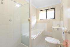  3 / 6 Ghilgai Avenue Aberglasslyn NSW 2320 $439,000 This modern 2 bedroom villa is situated in a well maintained complex of units, located close to public and private schools, local shops, transport, Stockland Green Hills, Maitland Private Hospital and the new Maitland Hospital and is only a thirty minute drive to the Newcastle CBD. A neat and tidy kitchen is on offer for the avid cook of the family and showcases ample storage/bench space, quality appliances including a gas cooktop and electric oven for family convenience. The master suite is incredibly spacious with a large built in wardrobe. A sense of light flows throughout the remaining bedroom that benefits from a large built in wardrobe. The bathroom is centrally located and is complete with both a bathtub and shower for family convenience. A single garage with internal access is provided for your convenience. Split system air conditioner for all year round comfort. Glass sliding doors off the kitchen / dining merge flawlessly out onto the private, low maintenance, fully fenced courtyard. 