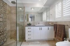  14 Gilson Place Howlong NSW 2643 $629,000 Fully furnished, only a stone's throw away from one of the region's highest-rated golf courses, this modern home offers a hole-in-one for buyers of all levels. Built by locally renowned builder Glen Hall, the home comes fully furnished, allowing you to turn the key and start living! The large master bedroom features an oversized walk-in wardrobe and ensuite with a single vanity and separate shower. The remaining three bedrooms are spacious, offering all the luxuries including built-in robes, ceiling fans and shutters. The main bathroom is positioned close to the bedrooms and is stylish with a separate bath and shower. Thoughtfully designed with family in mind, there are several private living spaces to get away and relax. The living area towards the front of the home makes the ideal space for a parents retreat or home theatre, whilst the open central living area incorporates both the kitchen and dining area. Recently updated, the kitchen maintains a practical design and layout, including stunning stone bench tops, modern appliances and more storage than you can poke a stick at, along with an oversized island bench and breakfast bar. Perfect for year-round entertaining, the alfresco area is enclosed with windows and blinds, which creates an ambience like no other. The hybrid design allows you to have a free-flowing connection from the kitchen/dining area through to the entertaining area. The large shed has been positioned perfectly for several applications, with vehicle access through the double lock-up garage and perfect side access. An enclosed walkway from the shed and garage to the home allows for easy access in comfort year-round. Other notable features of this home include solar, ducted heating and cooling, irrigation, shutters on most internal windows and established gardens. 