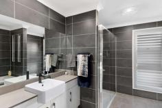  14 Skardon Terrace Albion Park NSW 2527 $1,250,000 - $1,320,000 Spacious, stylish and so brilliantly functional, this five-bedroom contemporary residence has been designed to add a touch of luxury to busy family living. Every element that's essential for home enjoyment is offered by this quality two-storey property, further accompanied by a open and airy living spaces that seamlessly integrate the heart of the home with a stylish outdoor alfresco and pool area. It makes the perfect option for those who demand style, size and position and wish to move into an expansive home in near-new condition that's centrally located to Albion Park amenities. Crisp and contemporary interiors feature quality inclusions throughout 4 spacious bedrooms, master featuring ensuite and walk-in wardrobe Well-designed floorplan offering multiple formal and casual living spaces Stunning kitchen with breakfast island and huge walk-in pantry Upstairs teenage retreat plus a ground floor guest bedroom or home office Ducted air conditioning throughout, 15kw solar system, rain water tank, garden shed A level flow to covered alfresco entertaining with BBQ, TV, bar fridges & hot/cold water In ground solar heated pool with travertine tiling, glass fencing & BOSE surround sound Top of the range CCTV system and alarm WiFi lighting, doorbell, front door lock and soft touch LED switches Double remote garage with off street parking Landscaped gardens with fruit trees, loads of yard for the kids & pets to play Within close proximity to shops, schools, cafes and restaurants An immaculate near new home ready to move into, without the headaches of a new build 