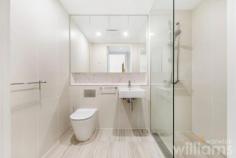  408/18 Birdwood Ave Lane Cove NSW 2066 Enjoying a green and leafy outlook, this one-bedroom apartment delivers unrivalled luxury in the heart of Lane Cove Village. Designed by Bate Smart Architects and built by renowned Australian firm Richard Crooks, the 'Quartet' development has rapidly earned the reputation as one of the most respected complexes within the area. Exquisitely appointed with a stunning Carrara marble and Miele-fitted kitchen, custom study nook and entertainer's balcony. Take a stroll through the manicured gardens to Lane Cove Village with its plentiful dining options, boutique shops, parks and express city buses. Conveniently located, the apartment is 500m to Lane Cove Village, 300m to major supermarkets Aldi and Coles and 150m to CBD bus route. • Contemporary elevated 4th floor one-bedroom apartment • Queen-sized, light-filled bedroom with built-in robe • Carrara marble full-sized gas kitchen with ample storage, Miele appliances • Designer bathroom with walk in shower and ample storage • Study nook with built-in desk, American Oak floors • Private covered balcony in an elevated position overlooking the internal gardens • Internal laundry, including dryer. Ducted air con. Lock up storage cage • Lift access from parking and street level. Security entry with video intercom. • Secure underground parking space. Plenty of visitor parking 