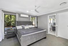  75 Helicia Cct Mount Cotton QLD 4165 This meticulously maintained home boasting a bright and open plan layout is wonderfully situated in an elevated position to perfectly capture the views of surrounding bushland and glorious sunsets from its expansive living area which flows out to a spacious alfresco entertainment area perfect for entertaining friends and family. Boasting four generously sized bedrooms and conveniently located in a low traffic, family friendly circuit just a short walk away from the local shopping village and parklands, and only minutes away from the Mount Cotton State School, this modern home will suit families big and small and is guaranteed to impress. - 680sqm Block in a Private Setting - Oversized Master Bedroom w/ Ensuite and WIR - Open Plan Kitchen, Dining & Living Areas - Spacious Covered Alfresco Entertainment Area - Split System A/C with Air Transfer System - Ceiling Fans Throughout - 6.5kW Solar System - Solar Hot Water - Water Tank - Under Home Storage plus Extensive Internal Storage - CCTV Cameras and Alarm System - Ceiling mounted, Bluetooth speakers - Covered carport and Side access with Electric gate - Established gardens with Raised veggie gardens - Walk to Mount Cotton Shopping Village and Parks 
