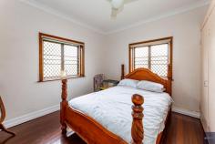  86 Maryborough St Walkervale QLD 4670 $359,000 Solid rendered/stucco brick, federation style home So close and convenient to major Schools & Shopping Centres, Clubs, CBD, Hospitals etc. 2 good sized built-in bedrooms + possible 3rd bedroom/Office Massive rumpus room at the rear – would be ideal for a teenage retreat with its own entry Great modern kitchen with hotplates, under-bench oven and stainless-steel canopy rangehood Large separate dining room with elegant French doors opening onto the lounge room Renovated, bright & airy bathroom 10ft ceilings with beautiful ornate cornices and skirting boards Sparkling polished timber floors throughout the majority of the home 807m2 allotment providing plenty of space in the back yard for family to enjoy Detached double carport Rental appraisal: approx $360 to $370 p/wk Rates: Approx $1800 per ½ year With properties selling so fast in our current market, act quickly to avoid disappointment, as this one will definitely not last. 