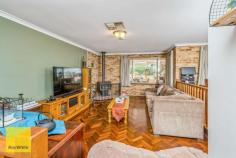  14 Rooth Road Lesmurdie WA 6076 $599,000 Conveniently located and across from the new Stirkwood Private Estate - this 3 bedroom brick and iron home built in 1985 offers a generous living space with quality fittings. 3 bedroom's and 1 bathroom, but with 2 WC's makes it ideal for growing families. There are built in robes in all the bedrooms and parquetry floors in the lounge and dining rooms, evaporative ducted air plus slow combustion heater for winter, solar hot water system and PV system (solar power) and established grounds with much money spent. Outside there is plenty of side access to the home through a double tandem carport and driving through to a large brick and iron outbuilding with electricity would make excellent vehicle storage / garage or studio or even a teen retreat. Set on an easy care 1012 sqm block and only a short stroll away from the local shops, primary and secondary schools, this home will suit a first home buyer couple, a family or those wanting to down-size or investors. 