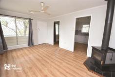  20 Dee St Biloela QLD 4715 $225,000 Welcome to 20 Dee St, a tastefully renovated 3 bedroom home which will pleasantly surprise you. Features include dine-in kitchen with brand new cabinetry and appliances, 3 bedrooms, 1 bathroom which has a separate toilet and a large living room with fireplace. New floor coverings throughout living areas and bedrooms. Outside you will find a large undercover entertainment patio and carport, 2 garden sheds with an awning, fully fenced perimeter and a front deck which takes in parkland views. 