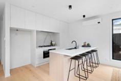  2/34A Johnstone Street Seaford VIC 3198 $840,000 - $924,000 An exclusive address showcasing thoughtful form, this brand new three bedroom residence delivers an effortless lifestyle defined by solitude and spirit. Poised at the rear and placed to enjoy privacy and seclusion, with close proximity to Seaford Foreshore and Seaford Wetlands, while Weatherston Reserve Playground anchors the cul-de-sac. Crisp lines and punchy interiors present a sophisticated backdrop to entertaining, flowing throughout open plan living and dining zones enriched by garden aspects. Impressing guests with a sleek aesthetic and functionality, the stone-topped kitchen indulges with high-end Bosch appliances including a 90cm oven and cooktop. Privately placed beyond entertaining dimensions, the master retreat with dual vanity ensuite and robes introduces the first of three bedrooms. Welcomed across the first floor, a secondary lounge fronts two upstairs bedrooms, a central bathroom and powder room, making this elevated level a family-friendly zone. Heating and cooling solutions ensure comfort across the seasons, whilst a decked alfresco, low maintenance gardens and a double garage confirm features. Find public transport, supermarkets and local recreation all within a short stroll, while easy access remains to major arterials for convenient city commutes. 