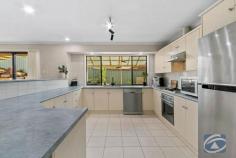  25 Expedition Drive Hewett SA 5118 $689,000 Grant and Bailey Fielke are proud to present to the market 25 Expedition Drive, Hewett. This fantastic sized family home close to walking trails residing on a wonderous 1397sqm allotment (approx.) full of beautifully established retained gardens, modern features, pool, spa and much more… Offering a convenient location being within walking distance to parks, schools and transport whilst only being within 40 minutes to Adelaide’s CBD, this property is the pinnacle of living. This gorgeous property features: * Decadent established gardens with sandstone feature retaining walls * Large master bedroom with quality carpet finishing's, a walk-in robe and spacious ensuite including double vanity * Large front lounge with vaulted ceilings * Open plan kitchen, meals and living area with plenty of windows allowing natural light to flood the room * The large kitchen with breakfast bar includes ample cupboard and bench space along with stainless steel appliances * A separate rumpus room which is a flexible space and can act as a rumpus, study, fifth bedroom or media room. * Remaining king size bedrooms include built-in- robes * The three-way main bathroom includes a large shower and bath and has the convenience of a separate toilet *Outside includes gabled entertaining area surrounded by established garden with drive through access into the garage, spa area and a fantastic deck and pool with water fountain overlooking the great views the property has. * Landscaped rear yard with sweeping views of the Concordia Ranges * The stunning rear yard is picturesque and maintained by the garden shed or garage, perfect for storing items * Take advantage of the possibility of rear access like neighbours have and erect a rear shed to come off Burke Parade (STCC) Other features include: * Evaportive Cooling *Gas Heating 