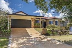  24 Attenborough Cct Redland Bay QLD 4165 Peacefully positioned in a quiet tree-lined street of the highly sought-after Orchard Beach Heights estate, this quality home is only a short stroll to the waterfront and parklands, and close to shops, schools, and transport. Oozing street appeal with it?s stunning bay windows, this beautiful and ultra-spacious family home sits proudly on an elevated 700m2 block. Appealing equally to growing families and passionate entertainers, this light-filled and comfortable home will captivate with its alluring proportions and exceptional floor plan. Boasting 5 generous-sized bedrooms, 2 bathrooms and 2 living areas that connect effortlessly to the outdoors. An open plan kitchen, living & dining room, formal lounge & dining, gourmet kitchen, large laundry, new carpets, new electric hot water system, downlights and air-conditioned throughout and double lock-up garage with internal access. The massive outdoor entertainment area is private and captivating with its stunning sandstone pavers and overlooks the sparkling concrete inground pool with a waterfall that is set in tropical surroundings. With a magnificent space like this, it will be delightful to entertain family and friends all year round! Features of this property: ? Lowset brick home on large elevated 700m2 block ? Master Bedroom with huge walk-in robe, ensuite, air-conditioning, fan, downlights, and glass sliding doors leading to the entertainment area ? 4 other generous-sized bedrooms with built-in robes, air-conditioning, fan & downlights ? Gourmet kitchen with breakfast bar, plenty of storage & bench space, Ariston dishwasher, Westinghouse cooktop and oven, microwave nook, double sink, laminate benchtops & fridge plumbing ? Large and spacious open plan kitchen, living & dining area with fan ? Formal lounge room with bay windows, air-conditioning, double door entry & concertina door ? Large laundry with plenty of storage ? New carpet ? New electric hot water system ? Compliant smoke alarms ? Security screens and doors throughout ? Downlights throughout ? Air-conditioned throughout ? Double lock garage with built-in robe & internal access + double carport ? Insulation to ceiling ? Massive covered outdoor entertainment area ? Sparkling inground pool with waterfall plus new pool chlorinator ? Landscaped & easy to maintain gardens ? Termimesh ? Garden shed ? Water tank 3000 litres ? 6kw solar system (24 panels) ? Small side access of 2.3 metres for jet ski, canoe, etc ? Quiet, tree-lined & house proud street ? Waterfront only 850m ? Redland Bay Shopping Centre 2km ? Redland Bay Golf Club 3.2km Homes of this quality and size are often sought but rarely offered! 