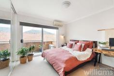  2/19 Altona St Abbotsford NSW 2046 Nestled in a private and secluded spot on one of Abbotsford's best streets, this well-presented townhouse will delight young families and downsizers alike. Set over two bright and airy levels, the home offers an easy-care layout and plenty of space. Family dining and relaxed play are a breeze thanks to the open-plan ground floor living area that flows out to a secure courtyard with tiled terrace and timber fencing. The roomy upper level contains a generous master with built-in robe and balcony, plus queen-sized guest room, linen press and additional storage. Whatever the weather, the double lock-up garage with internal access makes leaving or arriving home comfortable and convenient. Right in the heart of the peninsula, the townhouse is only 200m to village dining, 250m to bayside parks, and 800m to Abbotsford Public School. • Modern two-bedroom townhouse in a prime Abbotsford location • Light-filled open plan living and dining area with timber floorboards and air con • Level access from living area to large, secure courtyard and tiled terrace • Full sized kitchen featuring dishwasher, electric cooking, and ample storage • Separate laundry adjoining kitchen, includes W.C and sink • Queen-sized master, featuring large built-in robe, air con, and balcony • Spacious guest bedroom including built-in robe • Neat bathroom featuring bath, separate shower and vanity. • Internal access to private double lock-up garage. 
