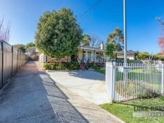  82 Schruth St N Kelmscott WA 6111 $400,000 WOW!! check out this character filled older style 3 bedroom 1 bathroom home set in this highly desired foothills location just a stroll to train, bus and Creyk Park. A generous and roomy designed floor plan including separate lounge and dining. Boasting beautiful polished timber floors plus family room overlooking the back garden. The lovely timber kitchen has so many cupboards and is light and bright. ( it also has a dishwasher ). Even and extra sun room and back verandah out the back which could be a study area or just ideal for some winter sun. The huge feature here is the fantastic sized workshop with access down the side. Ideal for the tradie or to house your prized toys. Extras include air-conditioning. slow combustion wood heater, lashings of timber ( old style quality ), chefs kitchen, gated and secure garden all set on big 812 sqm block. Don’t compromise on location or style. 