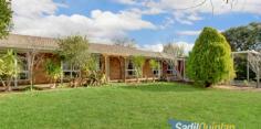  5 Bale Pl Richardson ACT 2905 $850,000 Modernised Colonial Home on a huge 1401m2 block Poised at the end of a very quiet cul de sac on a huge, level 1401m2 block of land. A distinctive colonial design with a full length front verandah offering added protection from the summer heat. Open plan lounge-dining-family areas are supplemented by a generous rumpus, playroom. Reverse cycle heating and cooling plus some double glazed windows enable the home to maintain a consistent temperature through Canberra’s extreme weather seasons. A bespoke kitchen features an upright gas stove, voluminous cupboard and bench space and dishwasher. The bathrooms and laundry have undergone a similar makeover. Bi fold doors flow onto a large, covered timber deck ideal for alfresco dining whilst perched over your miniature estate complete with an additional lockup garage, swing and play equipment, safe and secured by colorbond fencing and gates A beautiful home, very private and well maintained on an extremely rare by today’s standards, enormous block of land. Still plenty of scope for further development. An ideal home for a growing family, a start-up or someone who appreciates their own space. Highlights • Modernised 3 bedroom ensuite Colonial home • North-east aspect • Full length verandah • Double carport • Open plan lounge-dining area • Air-conditioning/heating • Family area opens through bi fold doors onto a timber deck and pergola • Large rumpus room • Some double glazing • Modernised kitchen with stone benchtop, generous cupboard and bench space, dishwasher and upright gas stove • Upgraded laundry with external access • Modern bathroom and separate toilet • 3 bedrooms with mirror robes • Huge flat enclosed backyard with colorbond fencing • Double metal garage, children's play area and storage shed • Supreme location at the end of a quiet cul de sac • One of the largest blocks in the area at 1401m2 