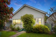  13 Park Street Hamilton South NSW 2303 $1,050,000 In a quiet Hamilton South pocket with Learmonth Park at one end of the street and Newcastle Racecourse and Beaumont Street at the other, this period prize is full of promise and opportunity. Instantly catching your eye with its original coloured glass windows, ornamental fireplace, and picture and hip rails there is so much potential in this home. Positioned on a north facing 430sqm block with rear access into parking, you could add instant value with some modest updates, right through to a full renovation or even hitting the reset button with a knock down and rebuild into your dream forever home (STCA). This is a charming, inviting property with a welcoming ambience, adjoining lounge and dining areas, and two generously proportioned bedrooms. A gas fitted kitchen, bathroom and laundry, enclosed verandah and sunroom complete the internal dimensions, while a level backyard offers a blank canvas to create a garden and alfresco of your choice. In the catchment zone for prized Hamilton South Public School, Park Street is one of those rare places where neighbours become good friends. Stroll around the corner and wander to Beaumont Street for coffee and dining or jump in the car and be on beautiful Bar Beach in just six minutes. - Classic two-bedroom 1930s home on north facing 430sqm block - Approximate block dimensions of 10.16m / 10.06m X 42.57m - Access via rear reserve into oversized single garage with workshop - Air-conditioned lounge and dining rooms, rear sunroom - Gas-equipped kitchen, older style bathroom/laundry - Enclosed side verandah creates a versatile extra space - 120m to Learmonth Park, tennis courts, kids' playground - 750m to the cosmopolitan shops and cafes on Beaumont Street - 2km to Newcastle Interchange, 3km to both Merewether Beach and Bar Beach 
