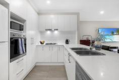  20B Osage Street Horsley NSW 2530 $820,000 - $850,000 You will be taken back by the beauty of this home that offers families a modern and low maintenance lifestyle. A picturesque setting overlooking the escarpment this 3 bedroom home built in 2019 is perfectly set amongst other quality homes in Brooks Reach Estate. Highlights include • 3 bedrooms plus a study and with ensuite off the master bedroom suite • Ducted air-conditioning • Views of the escarpment from rooms upstairs and the entertainment area • Fully tiled open plan living and dining area • Quality kitchen with 20mm stone benchtops, Smeg appliances, gas cooking and dishwasher • Two stylish bathrooms plus a 3rd toilet • Natural gas both inside and outside in the entertainment area • Massive 5 x 6 metre covered entertainment area overlooking North facing backyard • Level low maintenance yard with plenty of room for kids and pets to play • Garage with internal access • Torrens title home (no strata) • Designed by quality home builders "Hue Homes" 