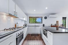  13 Amarula Place Cannonvale QLD 4802 $839,000 This modern family home is located in the heart of Cannonvale's most popular neighbourhoods, with all the privacy and tranquility needed to bring up the little ones. Situated just 10 minutes away from the exciting buzz of Airlie Beach this property is definitely for those seeking the Whitsunday's lifestyle. The contemporary abode itself boasts four bedrooms and three bathrooms on the spacious 823m² lot, fit with a large open-plan modern kitchen and cosy living area backing onto the vast timber deck creating a vibrant indoor/outdoor living experience in the costal breeze. What better way to kick back after a long day at work than a glass of wine overlooking the foliage of the Whitsunday mountains? The kitchen has been designed to the modern-day spec; with a gas cooktop, electric oven and dishwasher installed, combined with the expansive kitchen bench that can be used as a breakfast bar for busy mornings or entertaining guests in the evenings. All bedrooms come with air-conditioning units and built-in wardrobes, whilst the master-suite has its own walk-in wardrobe and ensuite, allowing comfort in the summer heat and seamless storage to help maintain the clean and uncluttered environment. Working from home? Enjoy the dedicated office space with enough room for all the essentials. For those who are looking to set their sails on the crystal-clear waters of the Coral Sea or explore the deep tropics of North Queensland there is ample room to store a boat/caravan whilst maintaining use of the generous double garage which allows internal access and two sizeable sheds. 