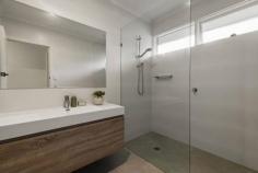  Unit 1/18 Second St Black Rock VIC 3193 $1,050,000 - $1,150,000 This renovated and ultra-stylish 2 bedroom villa offers luxury living within metres of sand and sea. Located up front in a boutique block of just three, embrace single-level simplicity with outstanding appeal as a first family home, downsizing choice or a high-return investment. The inspired open-plan living and dining, underscored by an all-new kitchen with sleek stone finishes, a waterfall-edged island bench and stainless-steel Kleenmaid appliances including an easy-clean induction cooktop, a full-sized dishwasher and an integrated fridge/freezer. Designed for entertaining not maintaining, neatly placed sliding glass connects the interior with the exterior on an elevated timber deck with exemplary perimeter privacy. A true extension of the interior, this protected showpiece will be enjoyed all year round. Stroll along the foreshore or the Bay Trial to iconic Half Moon Bay, Black Rock Village shopping, bus transport and a feast of bars, cafes and restaurants. Zoned to the highly sought-after Beaumaris Secondary College, Mentone Girls' Secondary College and Black Rock Primary School, your search ends here! - 2 large and bright bedrooms with built-in robes - Spacious open-plan living and dining - Brand-new L-shaped kitchen with a stone-topped island bench and the full suite of Kleenmaid appliances including an induction cooktop, dishwasher and a built-in fridge/freezer - Fully tiled bathroom featuring a frameless shower - Separate WC - Concealed laundry - Outdoor awnings - Elevated timber deck, perfect for alfresco dining and entertaining - Easily maintained garden - Remote-controlled garage with external access - Ducted heating plus split-system heating/cooling - Moments from schools, parkland, shopping, restaurants, transport and the local beach 
